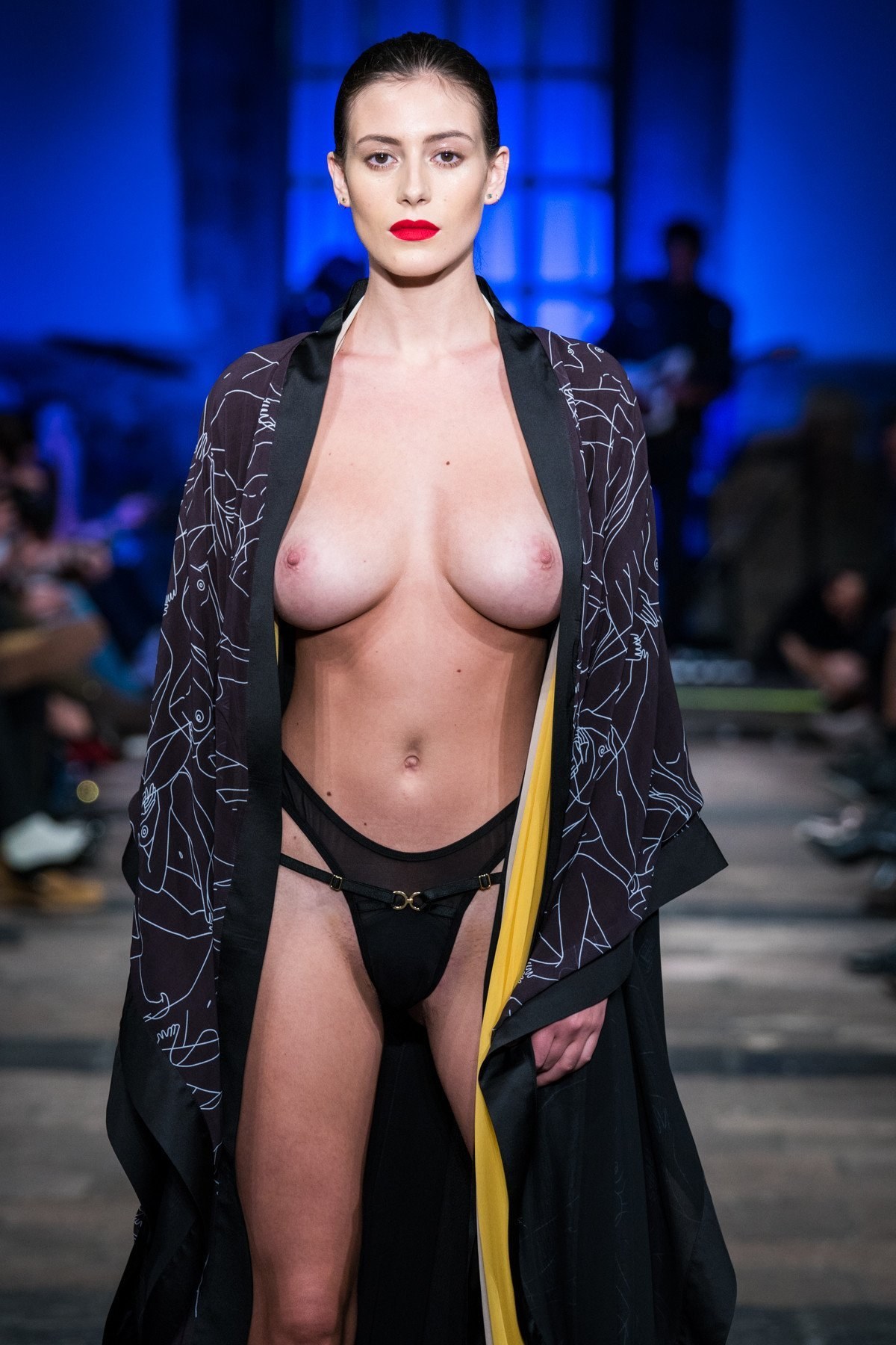 Big boob nude fashion show