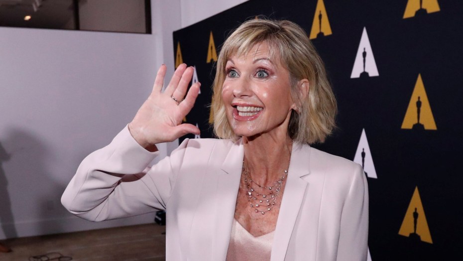 Оливия Ньютон в молодости в купальнике